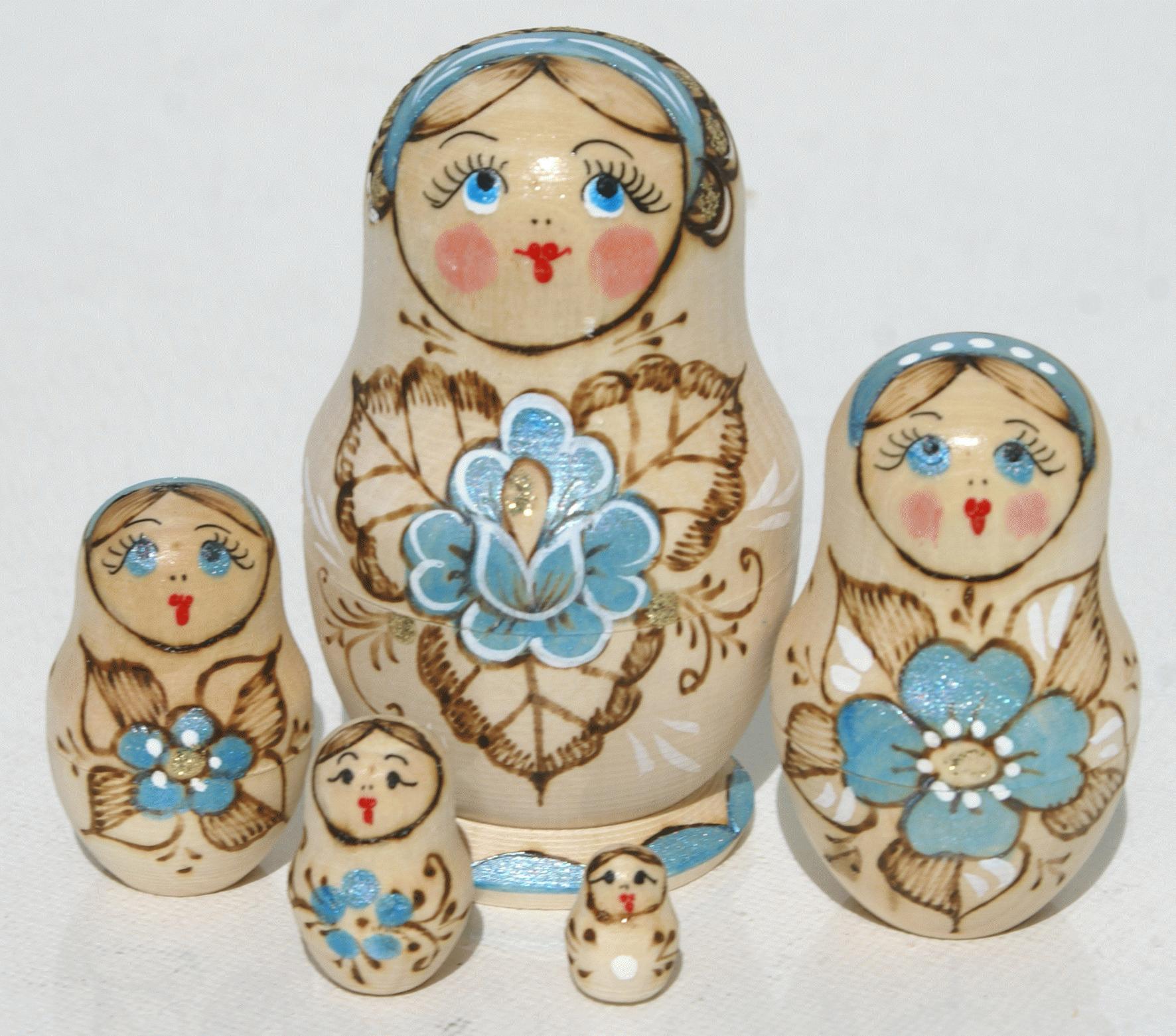Russian Nesting Dolls with Blue Floral Pyrography