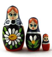 Mini Black Matryoshka with Daisy Motif